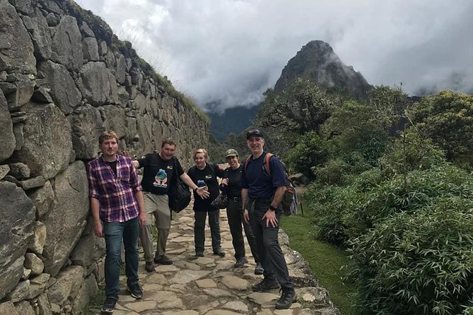 2 Days Inca Trail to Machu Picchu with hotel - Day 1 Inca Trail hike: Wiñaywayna, stone stairs, and arriving through Inti Punku