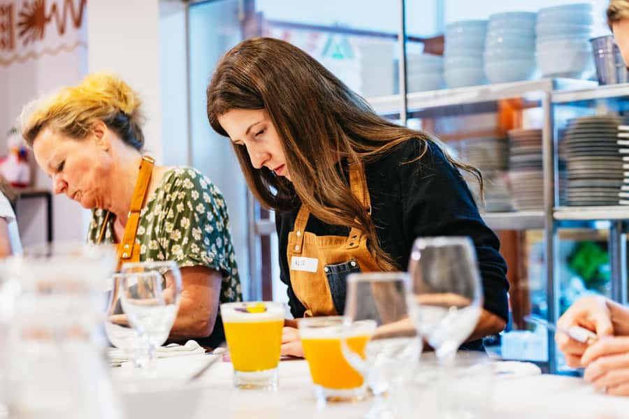 Cusco: Peruvian Cooking Class, Cocktails & Local Market Tour - Eating together: savoring your work at the table