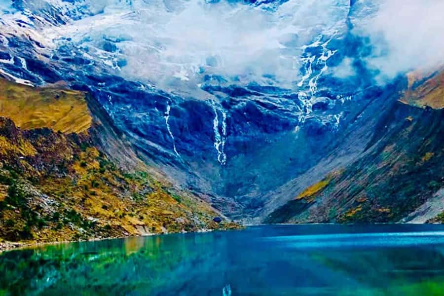 Cusco: Rainbow Mountain and Humantay Lake 2-Day Tour + Meals - Day 2: Humantay Lake’s 2 km climb, turquoise minerals, and the ceremony