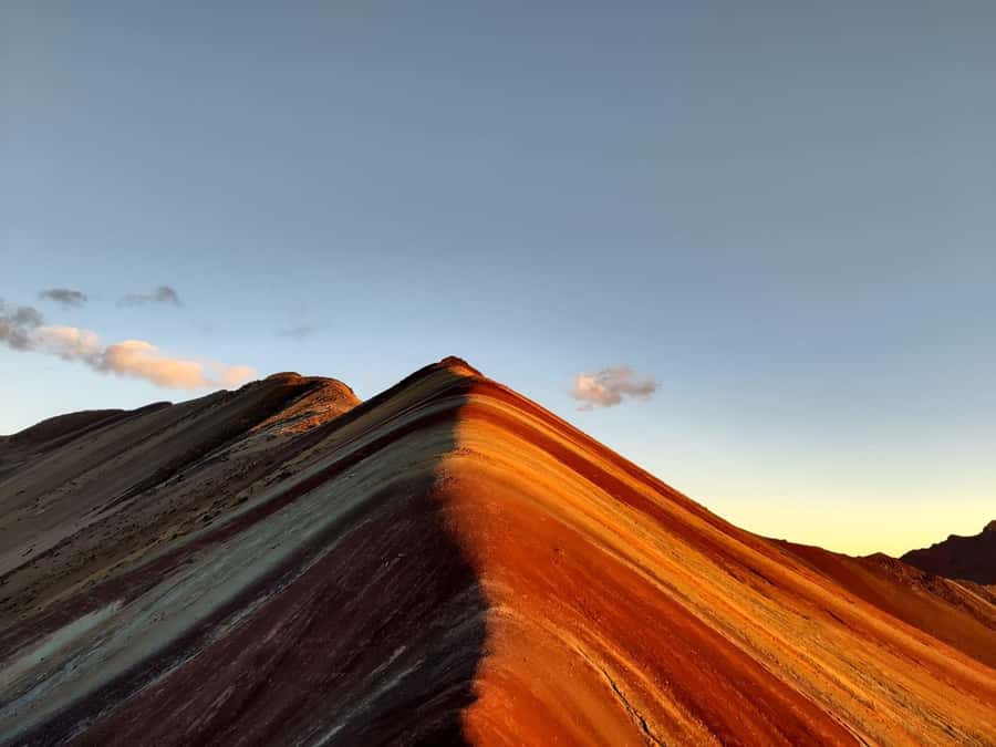 Cusco: Rainbow Mountain Tour at Sunset Without the Crowds - Pitumarca: a short guided start before you climb
