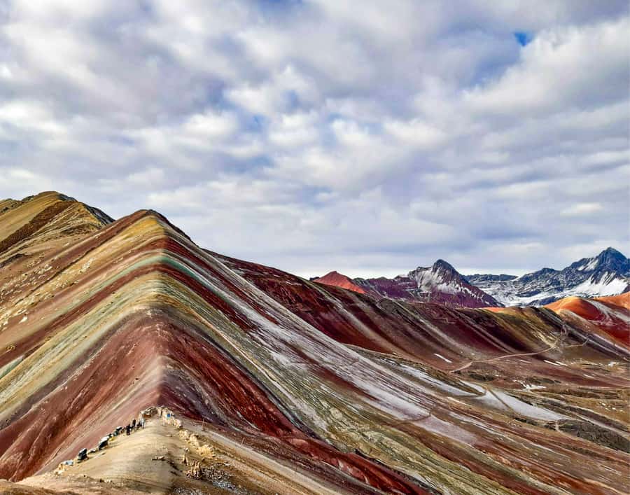 From Cusco: Full Day Rainbow Mountain + Red Valley | PRIVATE - Downhill Back to the Start: Why the Descent Feels Longer
