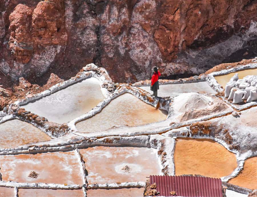 From Cusco: Moray, Maras Salt Mines & Chinchero Weavers Tour - Chinchero Weavers: Where the Day Gets Human