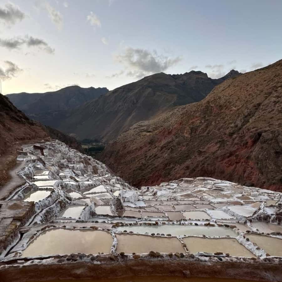 From Cusco: Sacred Valley VIP Tour with Buffet Lunch - Maras Salt Mines: Working Ponds and Ancient Production