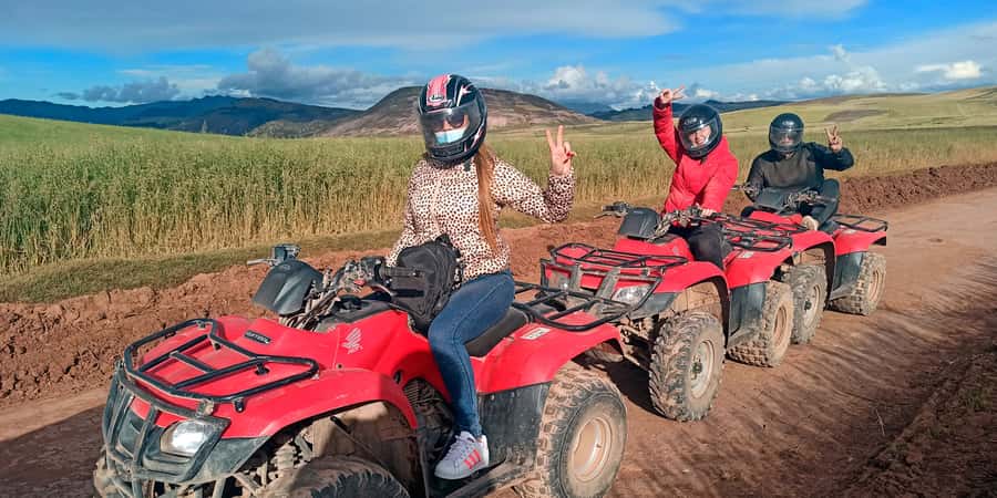 From Cuzco: Salt Mines and Moray Ruins ATV Adventure - First Stop: Salt Mines, Spring Water, and Panoramic Sacred Valley Views
