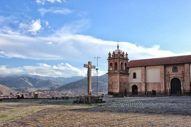 Open Bus Cusco City Tour - The sacred Inca temple footprint under a colonial church: a drive-through lesson you can feel