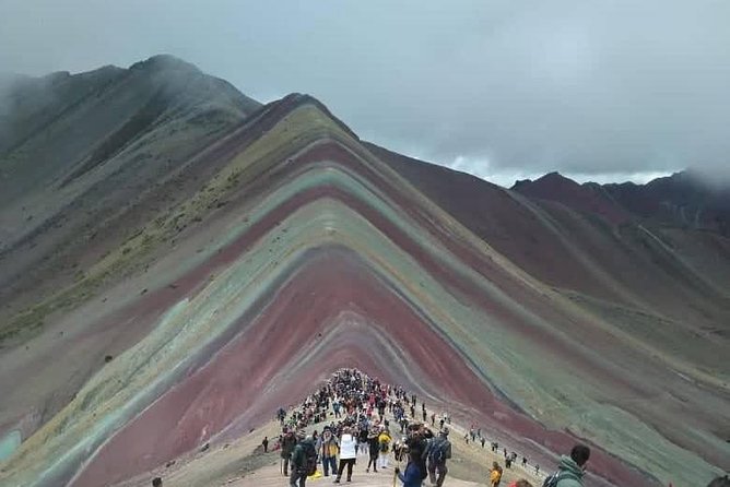 Rainbown mountain cusco 1 Day - Summit time: photos, rest, and panoramic payoff